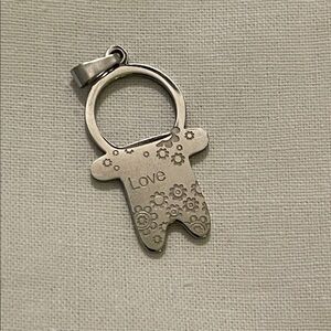 Silver Pendant boy with Floral Design 2” long